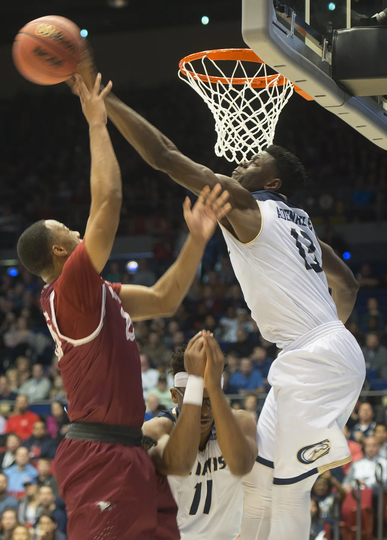 A UC Davis defender contests a North Carolina Central shot during an NCAA First Four game
