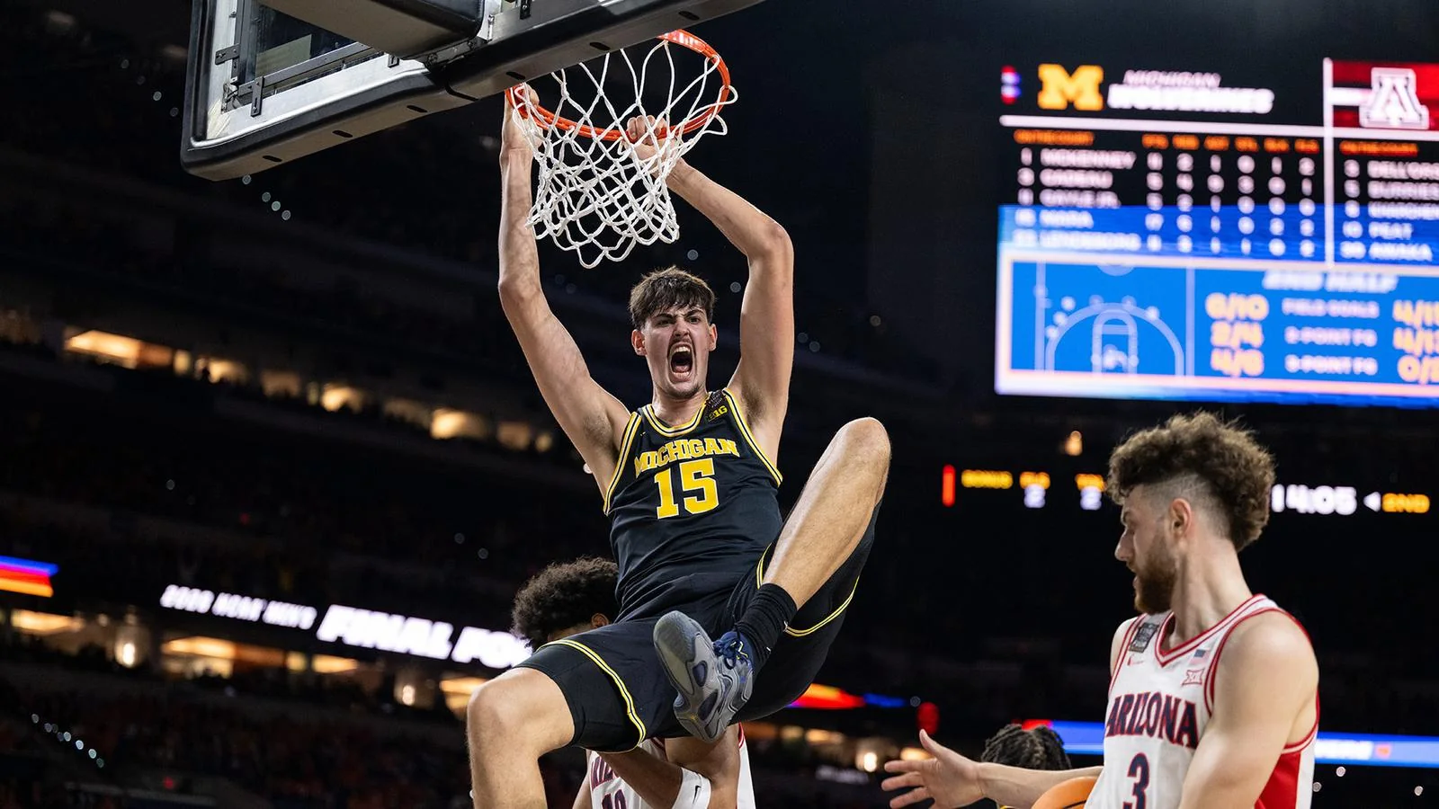 Michigan center Aday Mara dunks against Arizona in the 2026 national semifinal