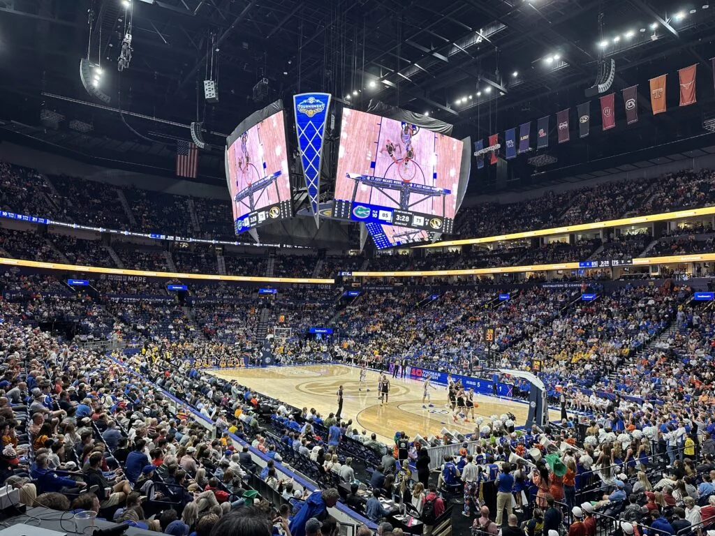 Basketball court and spectators beneath the video board inside Bridgestone Arena