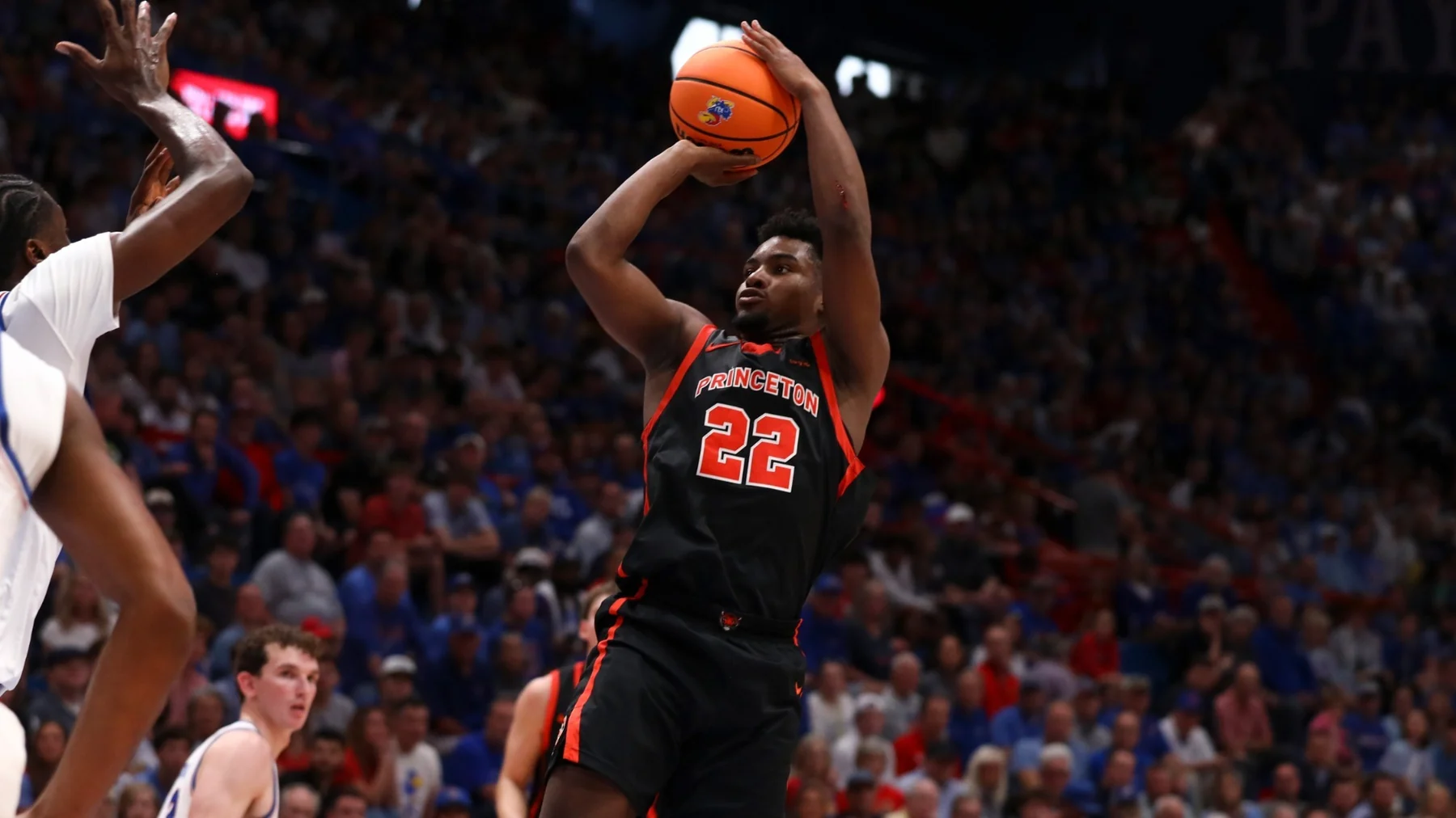 Princeton guard Dalen Davis shoots over a defender in an archived game photograph